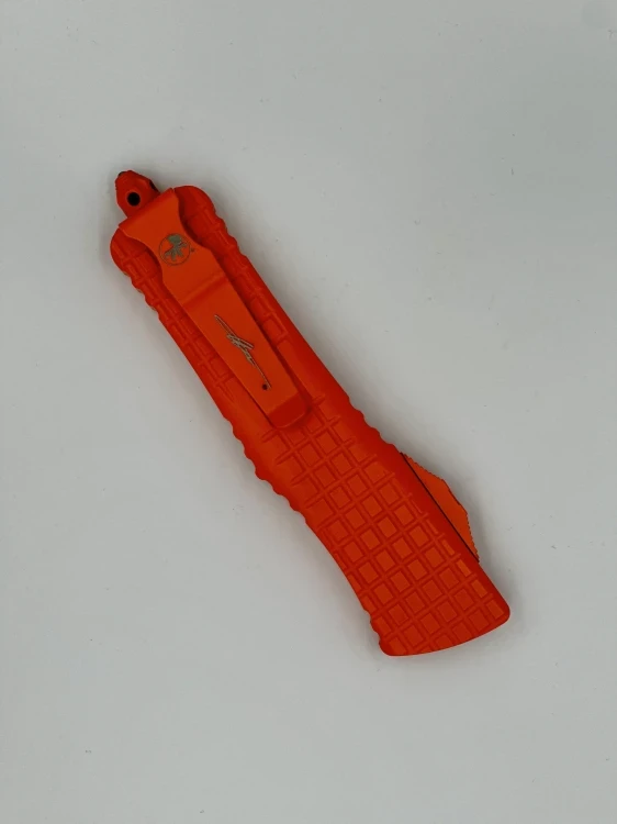 NÓŻ MICROTECH COMBAT TROODON T/E FULL SERRATE FRAG CERAKOTE ORANGE SIGNATURE SERIES
