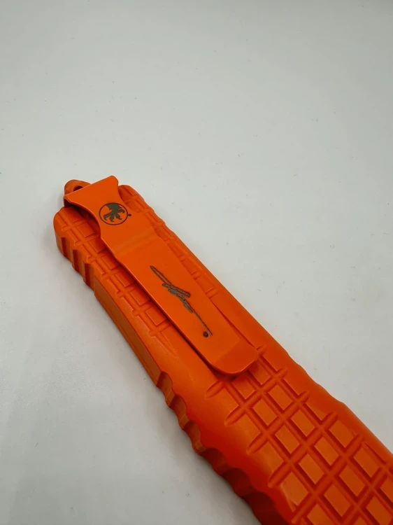 NÓŻ MICROTECH COMBAT TROODON T/E FULL SERRATE FRAG CERAKOTE ORANGE SIGNATURE SERIES