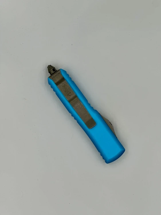 NÓŻ MICROTECH UTX-85 D/E APOCALYPTIC FULL SERRATE TURQUISE