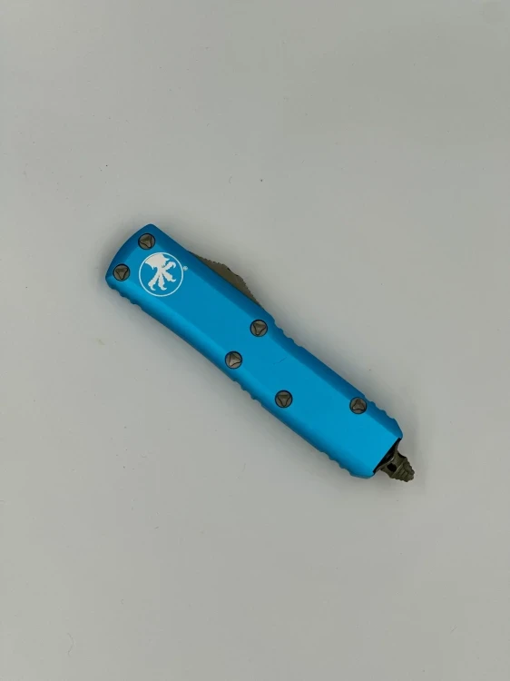 NÓŻ MICROTECH UTX-85 D/E APOCALYPTIC FULL SERRATE TURQUISE